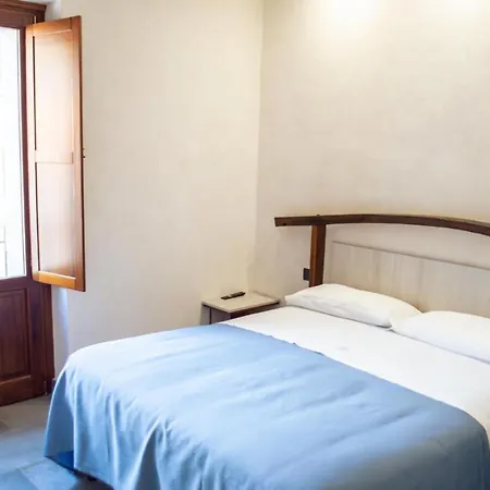 Palazzo Iaquinta - Rooms, Restaurant&wellness Affittacamere